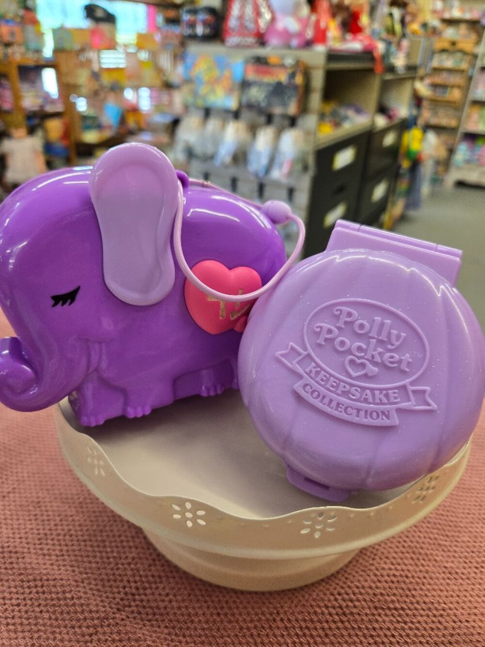 Newer Polly Pocket Lot as shown one compact empty the other with some pieces